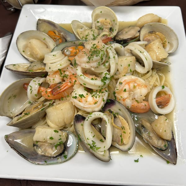 Bella Pasta's linguine with clams, mussels, shrimp, and calamari in a white wine sauce.